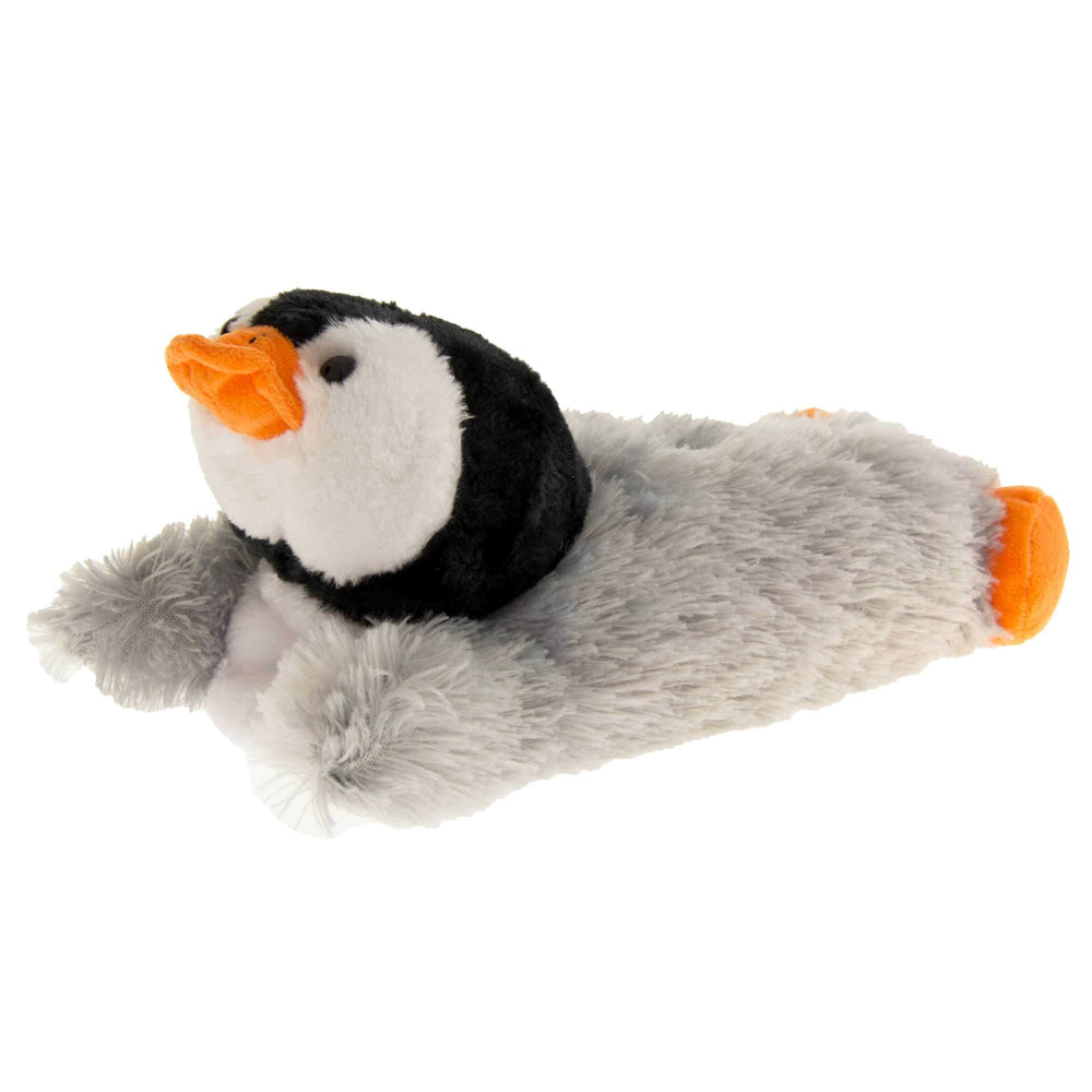 Penguin slippers. Womens padded slippers shaped like a penguin lying on its stomach. With grey faux fur body and black and white fluffy head. Left foot at an angle.
