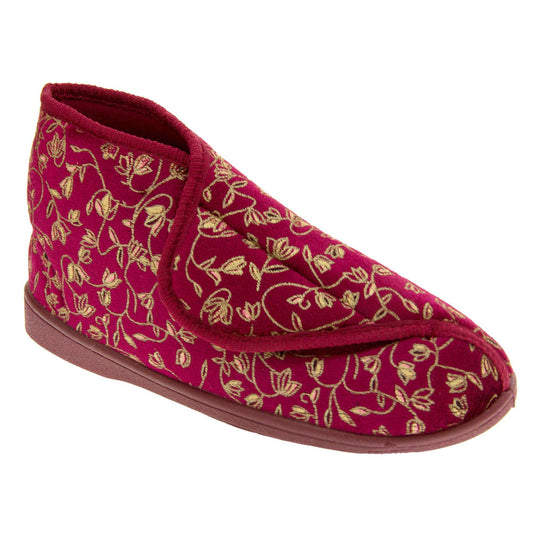 Ankle boot slippers. Womens bootie style slipper with a burgundy textile upper with vine and flower embroidered design and red edging. Touch fasten tab to the top and red textile lining. Firm red sole. Right foot at an angle.