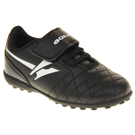 Astro turf boots. Black football trainers with stitching detail to the toes to give a quilted appearance. The touch close fastening and elasticated lace detail to the front. White Gola logo to the side and white Gola branding to the touch fasten strap. Black sole with small Astro turf studs to the base. Right foot at an angle.