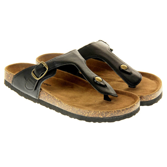 Black buckle sandals. Black faux leather strap with toe post to the front and gold buckle to the outside. Soft tan faux suede footbed with cork effect outsole and black sole. Both feet together at a slight angle.