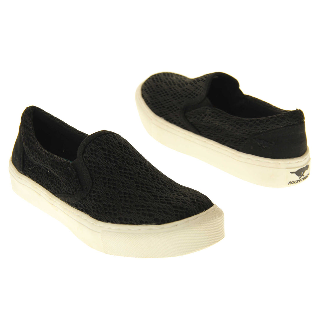 Black crochet shoes. Slip on plimsoll style shoes with a black canvas upper with a crochet overlay. Black elasticated gusset. White flat platform sole. Both feet at an angle facing top to tail.