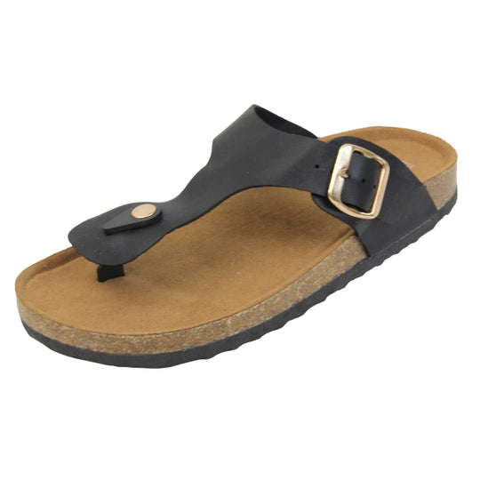 Black faux leather sandals. Black faux leather strap with toe post to the front and gold buckle to the outside. Soft tan faux suede footbed with cork effect outsole and black sole. Left foot at an angle.