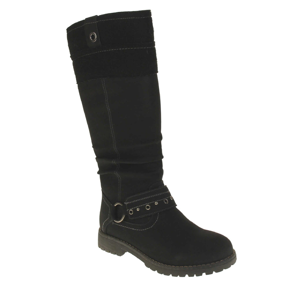 Black faux nubuck knee high boot. Tall boots with a black faux nubuck leather upper with a felt decorative cuff around the top. A strap with stud embellishment goes around the front of the ankle connected by a silver loop. Stitching detail around the outsole and the ankle. Full length zip to the inside leg. Right foot at an angle.