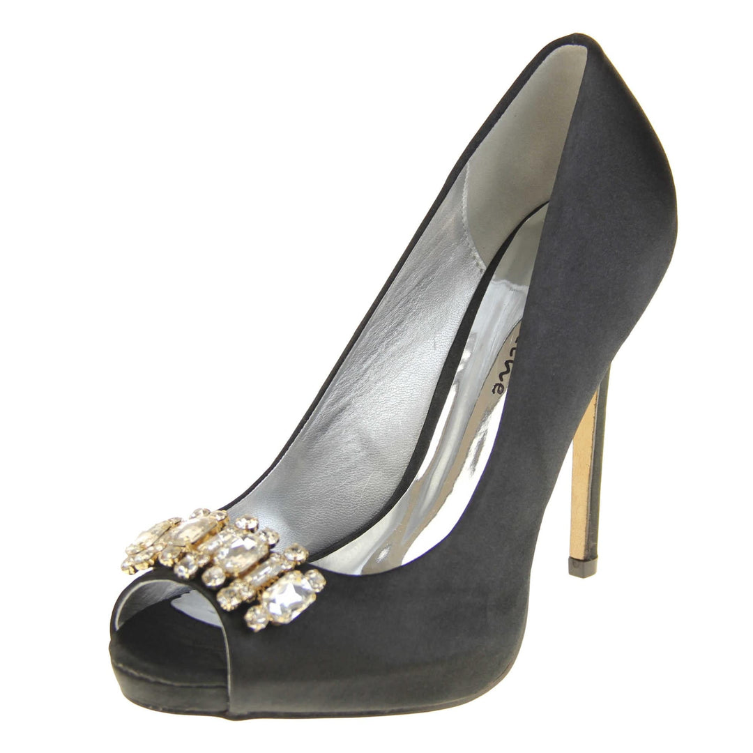 Black peep toe shoes. Classic women's peep toe high heels with a black satin upper. Metallic silver insole with Sabatine branding. Black satin stiletto heel with a cream sole. Diamante cluster detailing across the toes. Left foot at an angle.