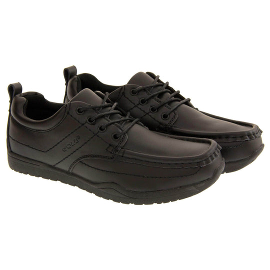 Black school shoes. Gola black leather school shoes, similar to trainer style. With stitched detailing and Gola branding embossed into the side. With black laces and a black loop on the heel to help pull the on. Black sole with good grip. Both feet together from a slight angle.