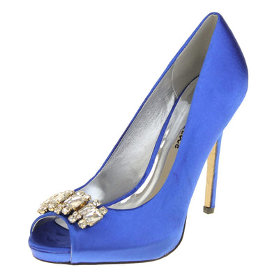 Blue peep toe shoes. Classic women's peep toe high heels with a blue satin upper. Metallic silver insole with Sabatine branding. Blue satin stiletto heel with a cream sole. Diamante cluster detailing across the toes. Left foot at an angle.
