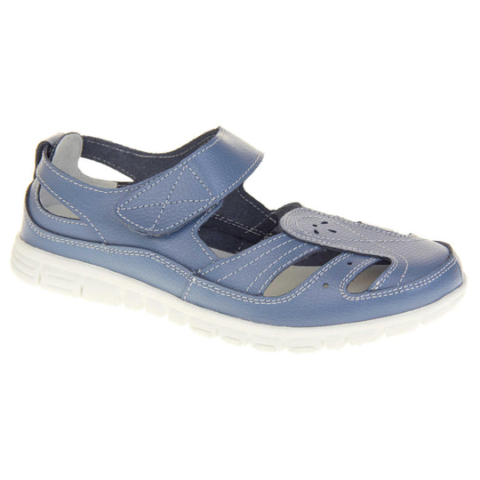 Blue wide fit sandals. Mary Jane style shoes. Blue leather uppers with white stitching detail. Blue touch fasten strap over the foot. Cut outs in the middle, edges and heel of the shoes. White sole with grip to the bottom. Right foot at an angle.