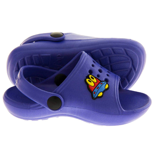 Boys Clogs. Blue synthetic clog style shoes. Open toed with cut out holes in the upper with alien detail just off centre. Blue strap that goes along the back of your heel. The strap can be moved along the top of the shoe instead to make the shoe a mule. Both feet from side profile with left foot on its side to show the sole.