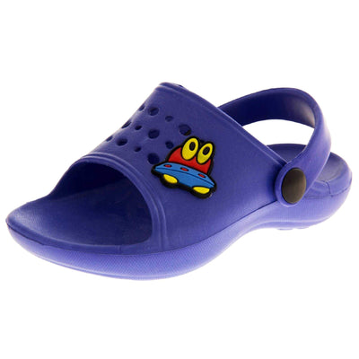 Boys Clogs. Blue synthetic clog style shoes. Open toed with cut out holes in the upper with alien detail just off centre. Blue strap that goes along the back of your heel. The strap can be moved along the top of the shoe instead to make the shoe a mule. Left foot at an angle