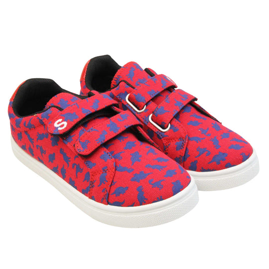 Boys dinosaur shoes. Kids trainers with a red canvas upper with blue dinosaur print. Two touch fasten straps over the top of the shoe with the top strap having the Skyrocket S logo on the end. Black textile lining and white chunky sole. Both feet together at an angle.