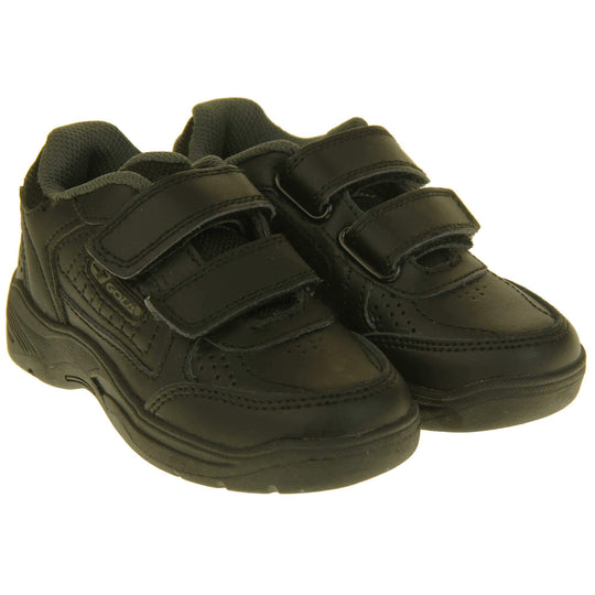 Kids trainers. Black leather Gola trainers with fabric tongue. With Gola branding and logo on the side and two touch close straps. The lining is grey textile. Black chunky sole with grip to the base. Both feet together from a slight angle.