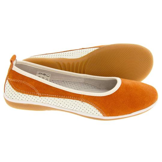Burnt orange shoes. Ballet style flat with an orange suede upper. White leather mesh runs along the bottom of the back half of the shoe. Brown sole. White edging around the sole and the opening of the shoe. White leather lining. Orange suede leather loop on heel of the shoe to help pull on. Both feet from a side profile with the left foot on its side behind the the right foot to show the sole.