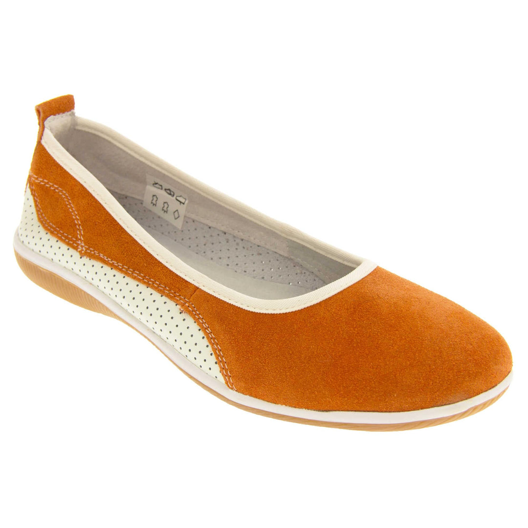 Burnt orange shoes. Ballet style flat with an orange suede upper. White leather mesh runs along the bottom of the back half of the shoe. Brown sole. White edging around the sole and the opening of the shoe. White leather lining. Orange suede leather loop on heel of the shoe to help pull on. Right foot at an angle.