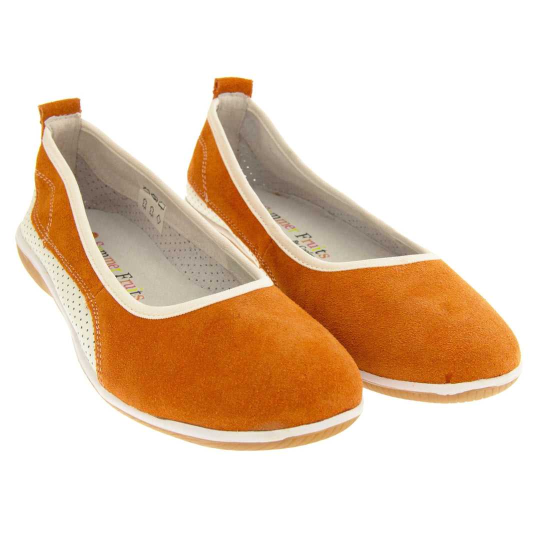 Burnt orange shoes. Ballet style flat with an orange suede upper. White leather mesh runs along the bottom of the back half of the shoe. Brown sole. White edging around the sole and the opening of the shoe. White leather lining. Orange suede leather loop on heel of the shoe to help pull on. Both feet together at a slight angle.