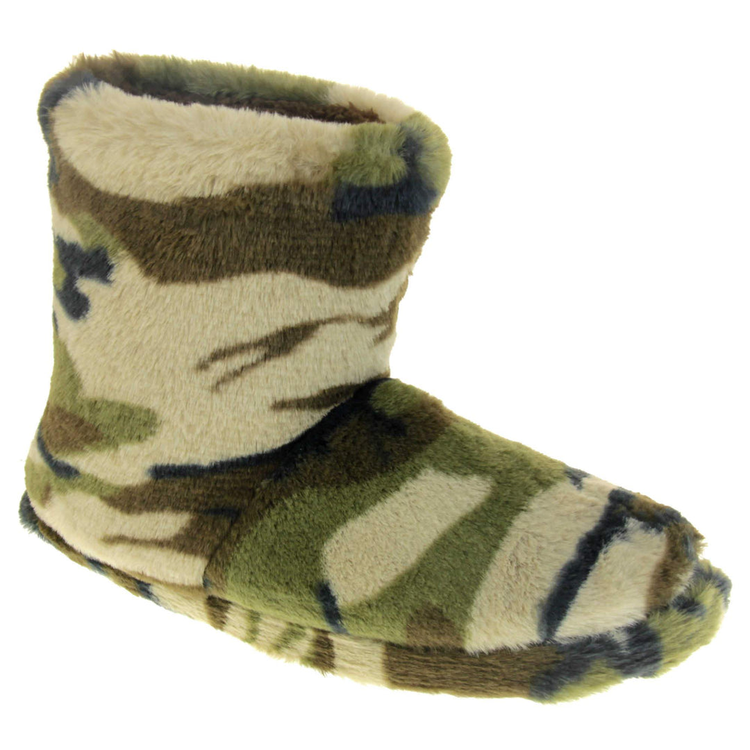 Camo slippers boots. Slipper boots with a camouflage army print faux fur upper. In khaki, brown, black and sand colours. With a firm black synthetic sole with grip to the base. Brown faux fur lining. Right foot at an angle.