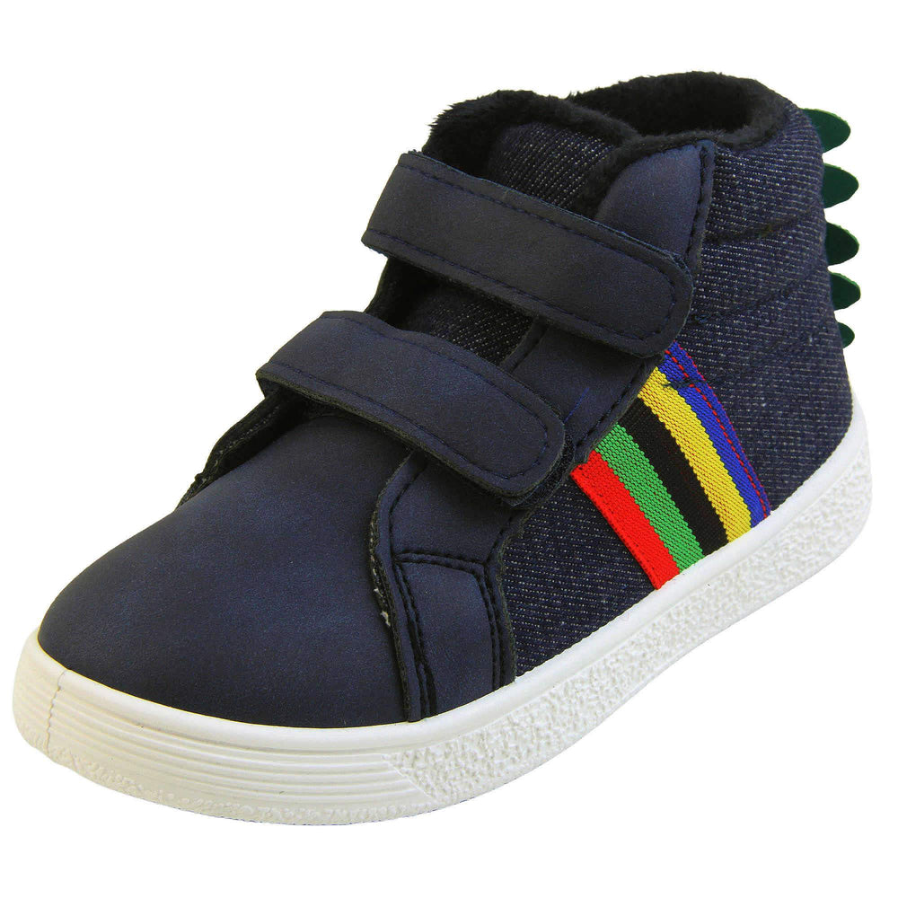 Kids Denim Blue Hi-top Trainer Boots - Denim blue and smooth faux leather upper with dual hook and loop fastening, white outsole, rainbow stripe to side, green dinosaur spine to heel and dark blue fleece lining. Left foot at angle.