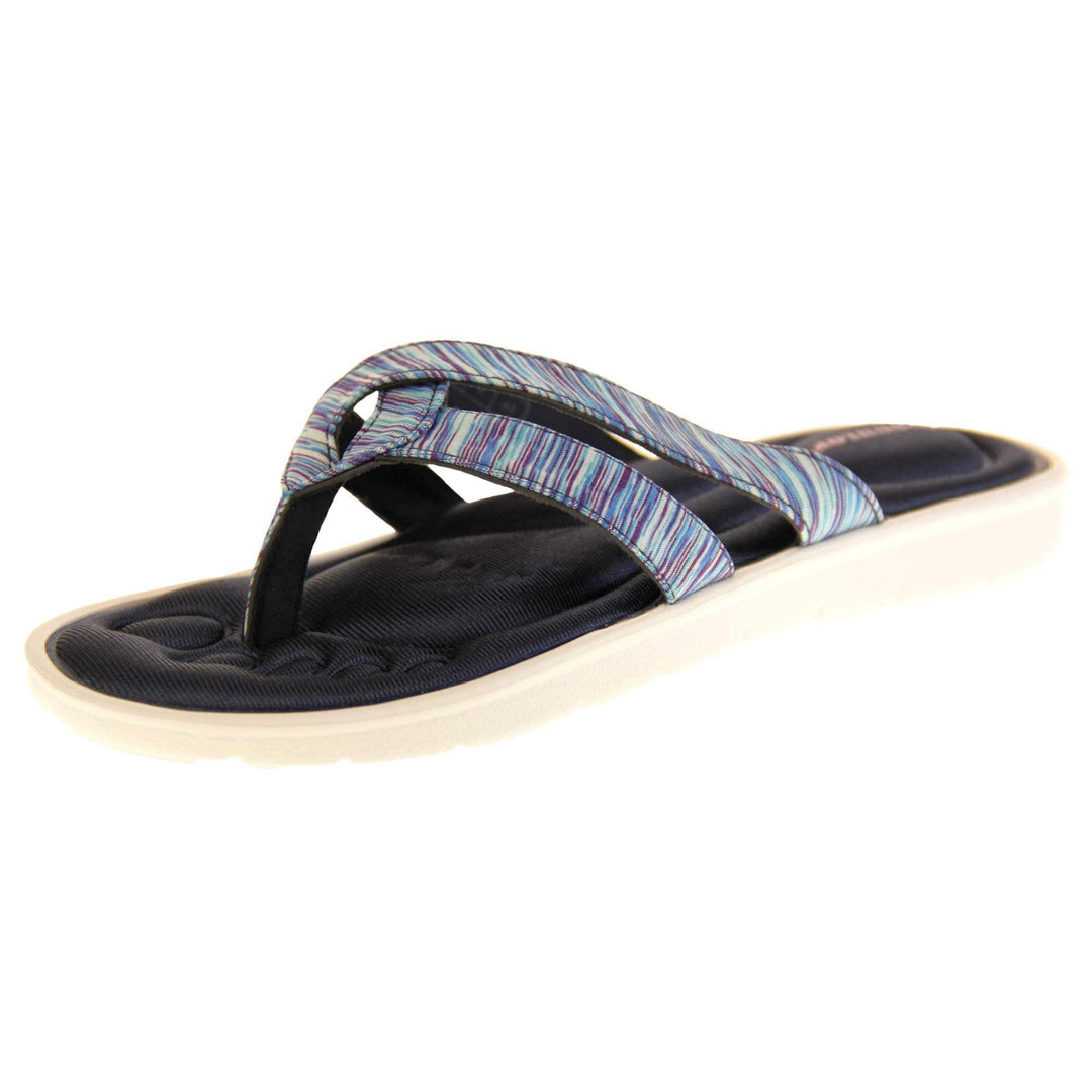 Dunlop flip flops. Womens flip flops with two straps done in a purple, teal and blue textile material meeting at a toe post. Black moulded, cushioned insole with white sole. Left foot at an angle.