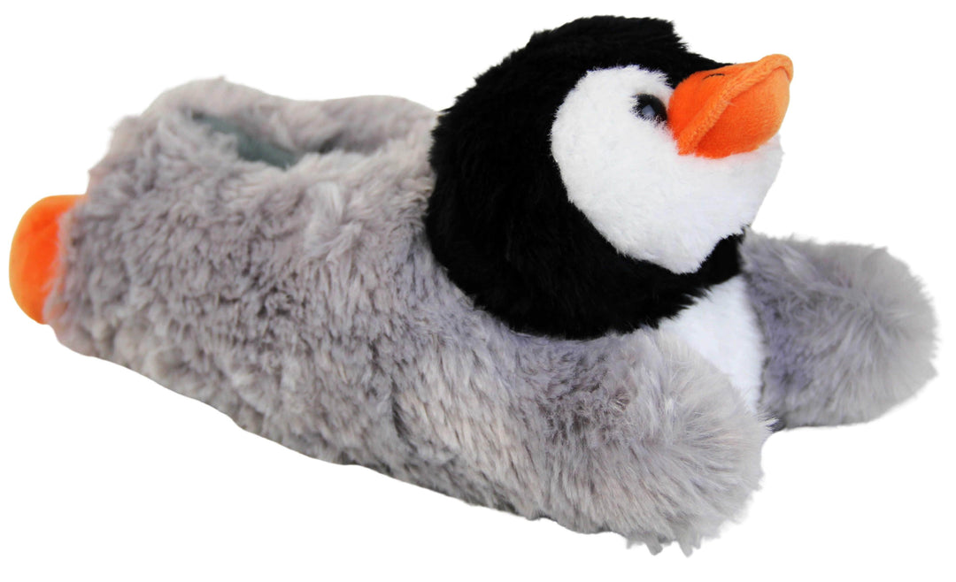 Kids penguin slippers. Slippers shaped like penguins. With a soft faux fur outer with cute black and white penguin face with orange beak and feet. Right foot an slight angle.