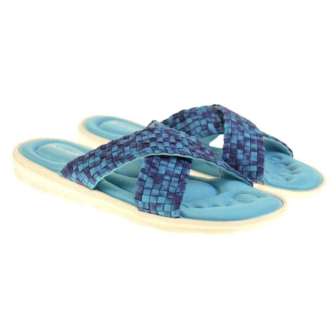 Womens slide sandals - Royal blue mosaic style straps in crossover design with dense memory foam insoles - perfect comfy sandals for women. Quick and easy slip on flip flops with light blue insole and white outsole with a slight wedge heel. Both feet at an angle.