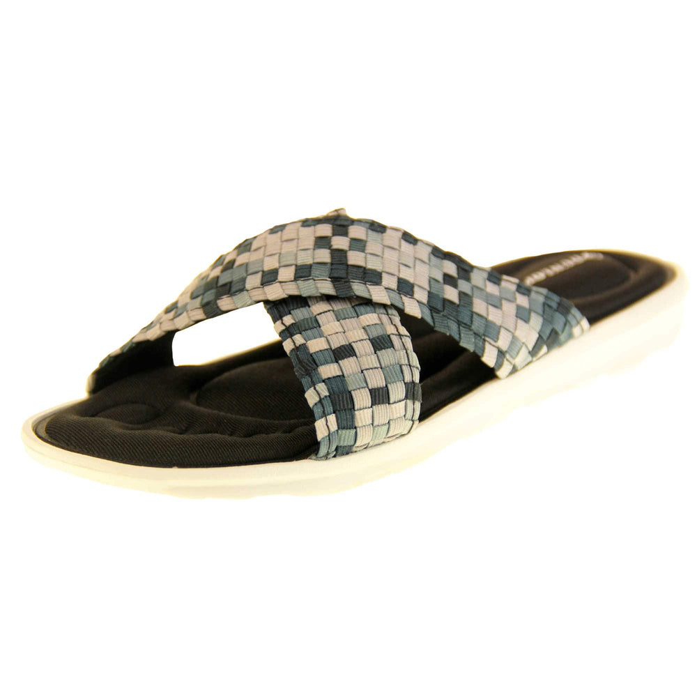 Womens black flat sandals - Black and grey mosaic style crossover straps with a dense black memory foam insole - perfect comfy sandals for women. White outsole. Left foot at an angle.