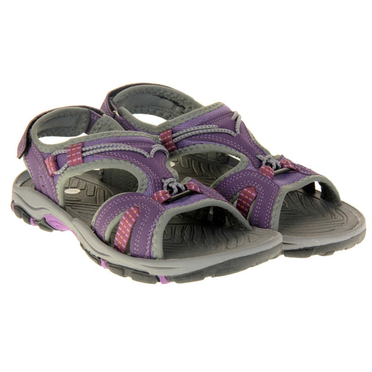 Womens Dunlop Hiking Sandals - Plum purple faux leather upper with light purple mesh and grey elasticated strap detailing around. Good grips to the sole and a hook and loop ankle strap for a secure fit. Grey, purple and black flexible outsole. Both feet together.