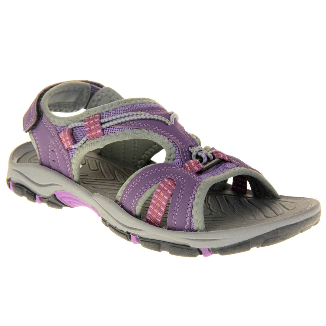 Womens Dunlop Hiking Sandals - Plum purple faux leather upper with light purple mesh and grey elasticated strap detailing around. Good grips to the sole and a hook and loop ankle strap for a secure fit. Grey, purple and black flexible outsole. Right foot at angle.