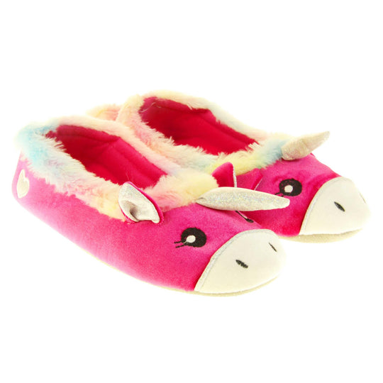 Unicorn slippers womens. Ladies slippers in a ballerina style. With bright pink velvety upper, cute embroidered horse face,shiny horn and rainbow faux fur collar. Warm pink lining. Beige textile sole with bumps to the bottom for grip. Both feet together at an angle.