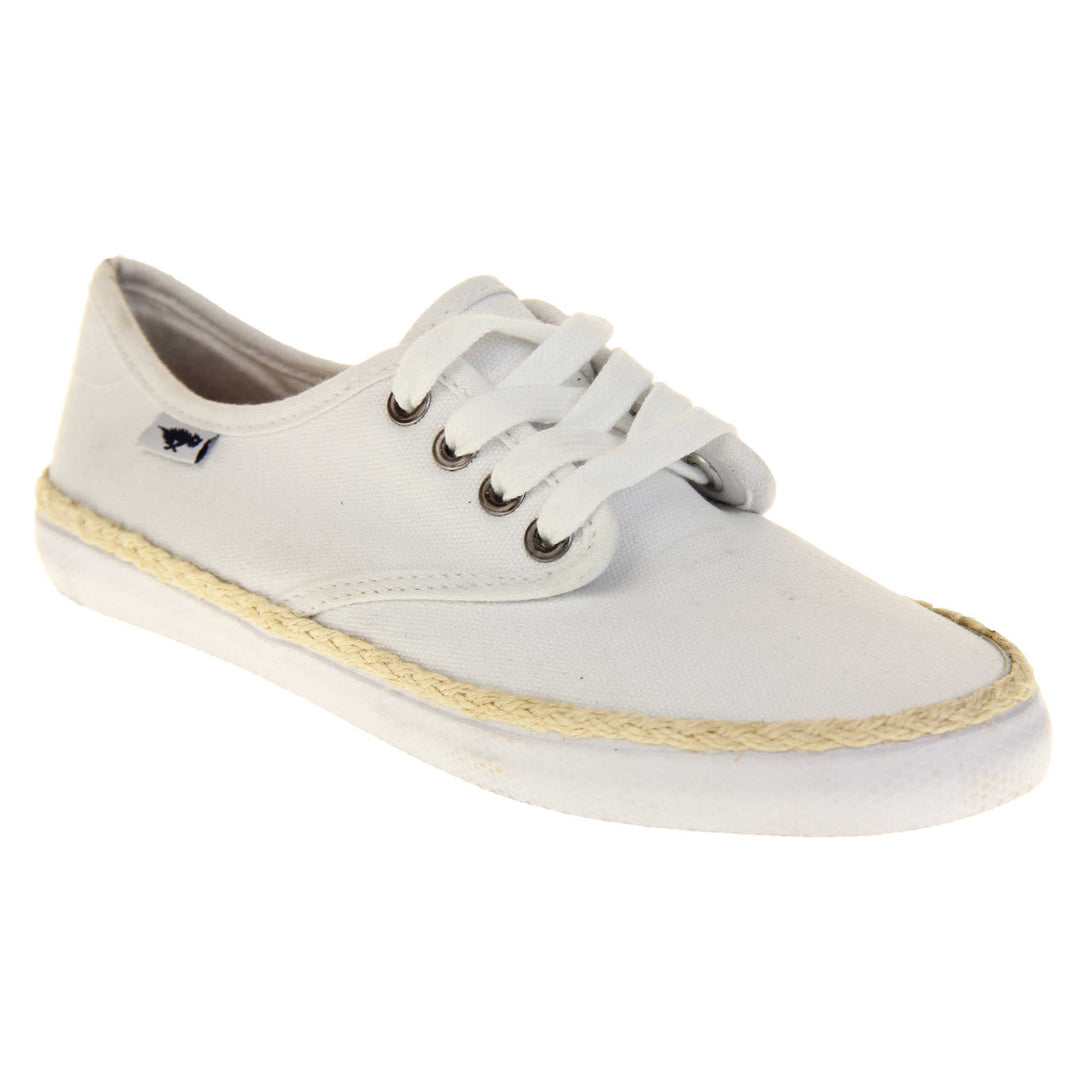 Espadrille pumps. Sneaker style shoes with a white canvas upper. White laces and a small Rocket Dog label to the side. White outsole with espadrille rope around the top. Right foot at an angle.