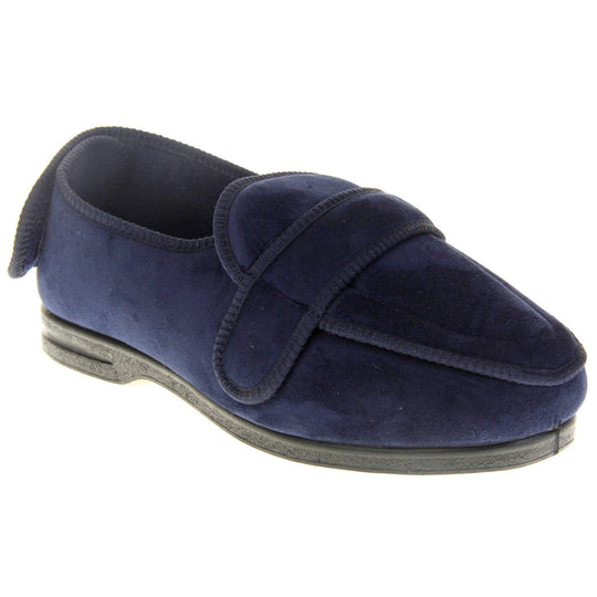 Extra wide fit slippers for men. Full back slippers with navy blue upper. Adjustable touch fasten strap to the top of the foot and around the back of the heel. Navy textile lining. Firm black sole. Right foot at an angle.