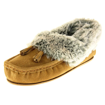Faux fur moccasin slippers. Womens brown faux suede moccasin style slippers. With stitched detailing and tassels with subtle glitter on. Pale grey faux fur collar and lining. Brown firm sole. Left foot at an angle.