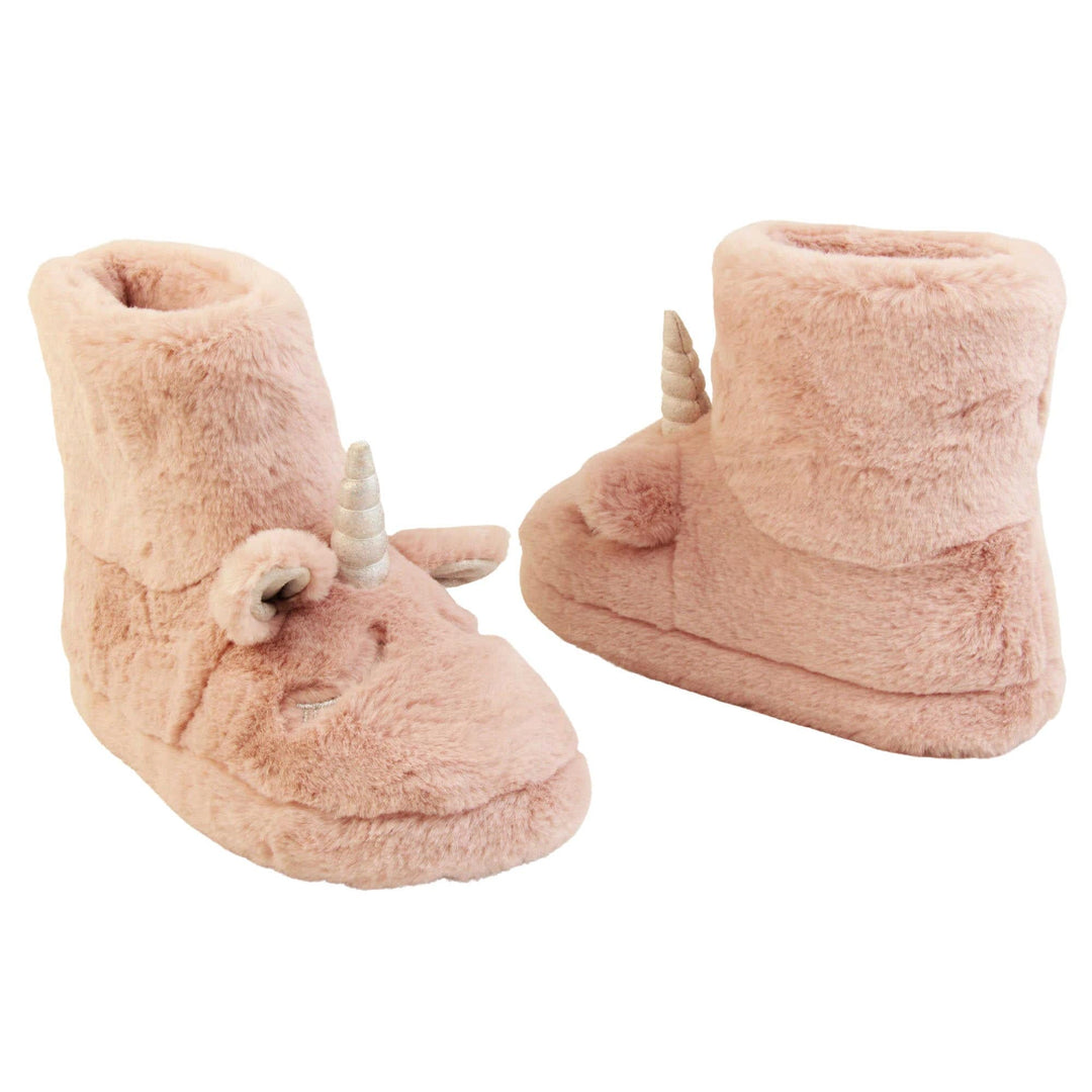 Faux fur slipper boots. Furry slipper boots in pink with a cute unicorn face on. With glittery ears and horn. The same colour faux fur lines the boot. Both feet from a slight angle facing top to tail.