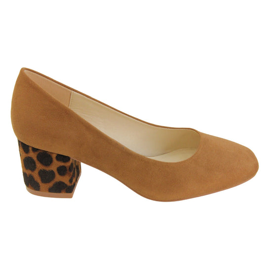 Faux suede low block heels. Womens court shoes with tan faux suede uppers. Faux suede leopard print block heel. Cream faux leather lining with beige textile lining at the heel. Beige sole. Right foot from a side profile.