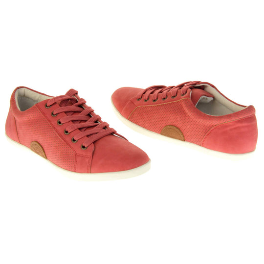 Faux suede sneakers. Women's shoes in a sneaker trainer style with a red faux suede upper. Tiny dot cut-out detailing to the side of the shoe. Red laces and a brown half-circle to the side of the shoe with Keddo branding on it. White leather lining and sole. Both feet at an angle facing top to tail.