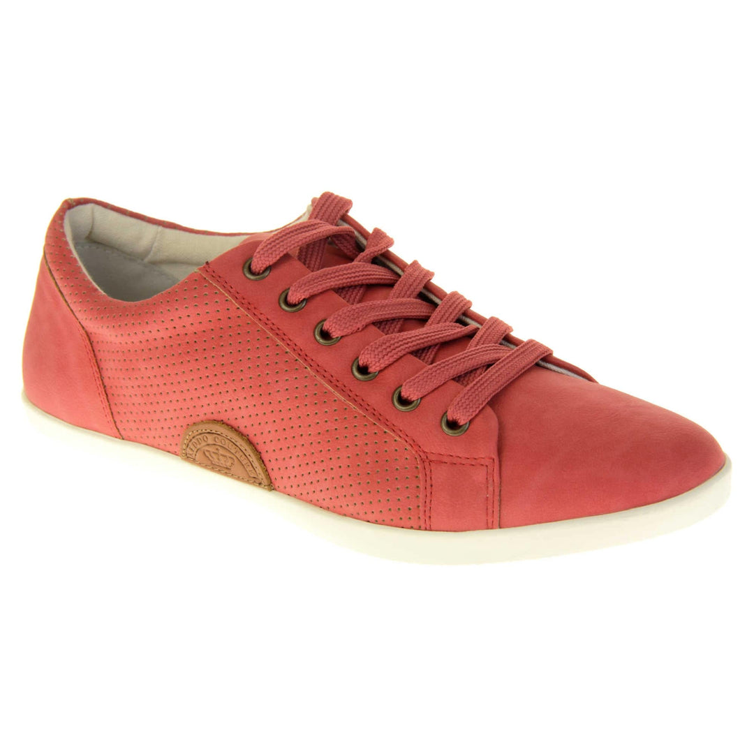 Faux suede sneakers. Women's shoes in a sneaker trainer style with a red faux suede upper. Tiny dot cut-out detailing to the side of the shoe. Red laces and a brown half-circle to the side of the shoe with Keddo branding on it. White leather lining and sole. Right foot at an angle.