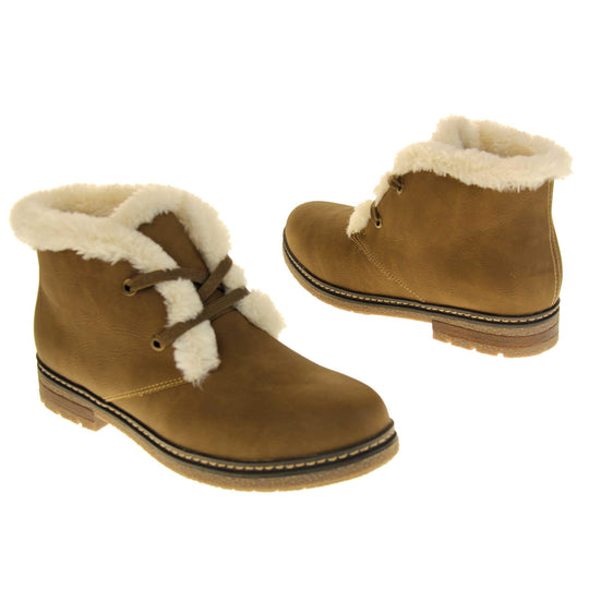 Fleece lined ankle boots. Women's ankle boots in a lace up style with a brown faux nubuck upperFleece lined ankle boots. Women's ankle boots in a lace up style with a brown faux nubuck leather upper. Brown laces with gold colopured eyelets. Cream faux fur trim and lining. Brown sole with grippy base. Both feet from a slight angle facing top to tail.