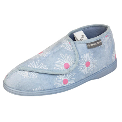 Flower slippers. Womens bootie style slipper with a pale blue textile upper with a white and pink flower print. Touch fasten tab to the top and blue textile lining. Firm blue sole. Left foot at an angle.