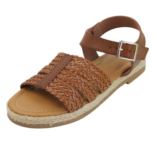 Girls flat sandals. Triple strap sandals with a faux leather dark brown upper. Three woven faux leather straps over the foot with a plain band down the middle. A plain ankle strap with silver buckle. Brown insole with brown lining. Brown outsole with jute rope style rim around the outside. Left foot at an angle.