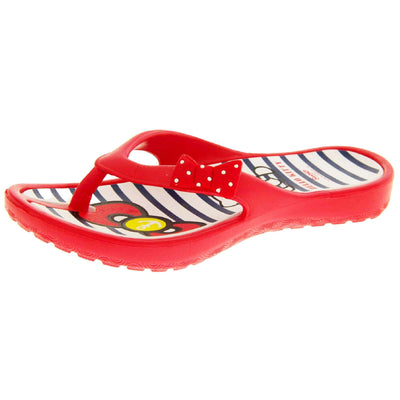 Girls flip flop. Hello Kitty flip flop with red sole and straps in a toe-post design with small red bow with white spots on. White and navy striped insole with Hello Kitty design on. Left foot at a slight angle.
