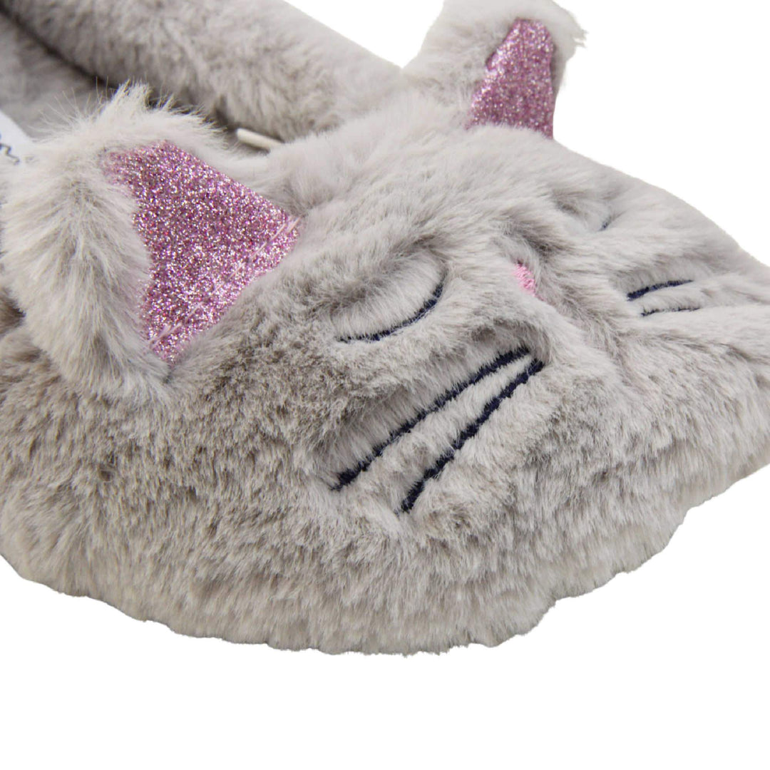 Girls fluffy slippers. Grey faux fur ballet style slipper with cat face stitched into the upper. Pink sparkly ear detail to the top of the upper. Lined with the same grey faux fur. Close up of cat face on upper.