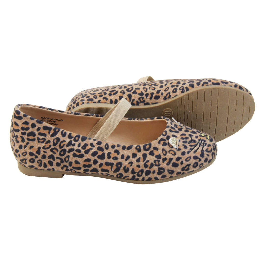 Girls leopard shoes. Ballerina style shoes with leopard print faux suede uppers and embroidered cat face to the front. With a beige elasticated over the foot strap. Beige lining and dark brown sole with very slight heel.  Both feet from a side profile with the left foot on its side behind the the right foot to show the sole.