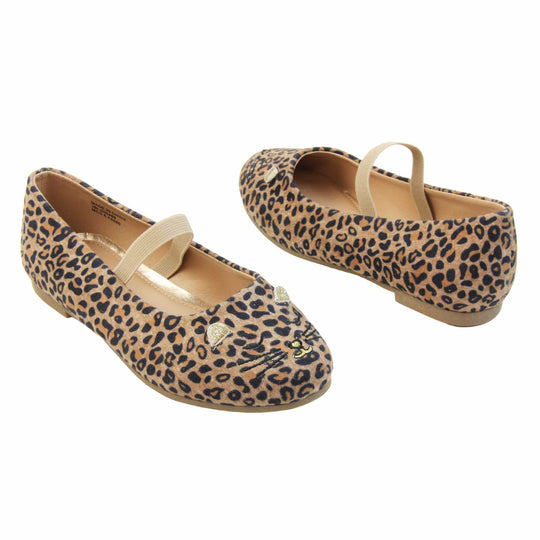 Girls leopard shoes. Ballerina style shoes with leopard print faux suede uppers and embroidered cat face to the front. With a beige elasticated over the foot strap. Beige lining and dark brown sole with very slight heel. Both feet at an angle facing top to tail.