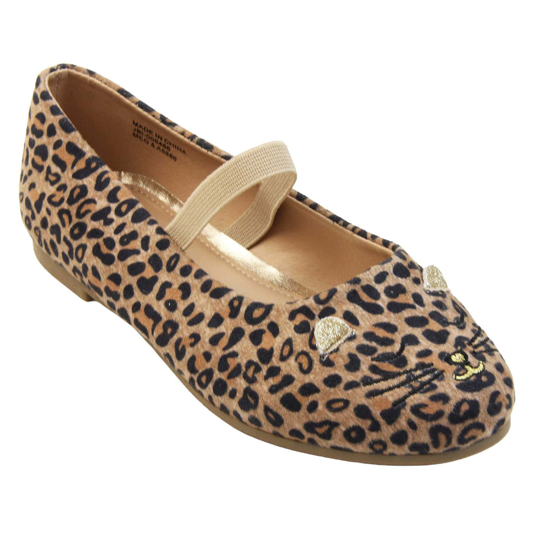 Girls leopard shoes. Ballerina style shoes with leopard print faux suede uppers and embroidered cat face to the front. With a beige elasticated over the foot strap. Beige lining and dark brown sole with very slight heel. Right foot at an angle.