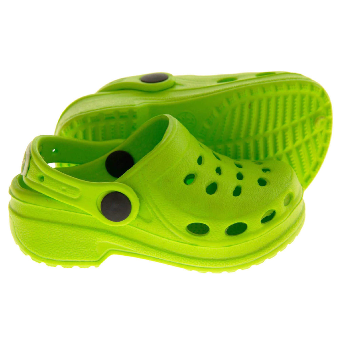 Girls Pool Shoes. Lime Green synthetic clog style shoes. Cut out holes around the toes and the upper. Green strap that goes along the back of your heel. The strap can be moved along the top of the shoe instead to make the shoe a mule. Both feet from side profile with left foot on its side to show the sole.