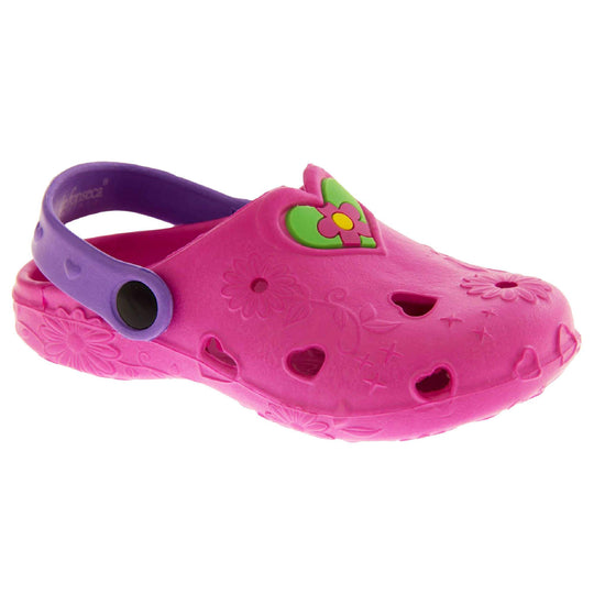 Girls Sandals. Pink synthetic clog style shoes with embossed flowers and stars. Cut out love hearts on the upper. Green love heart, with pink and yellow flower in the centre, to the middle top of the upper. Purple strap that goes along the back of your heel. The strap can be moved along the top of the shoe instead to make the shoe a mule. Right foot at an angle