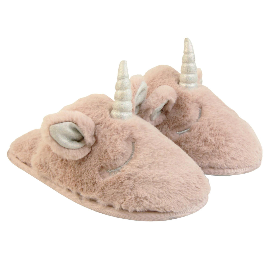 Girls unicorn slippers. Pink faux fur mule style slipper with a unicorn face stitched into the upper. Sparkly ear and horn detail to the top of the upper. Lined with the same faux fur. Both feet together from a slight angle.