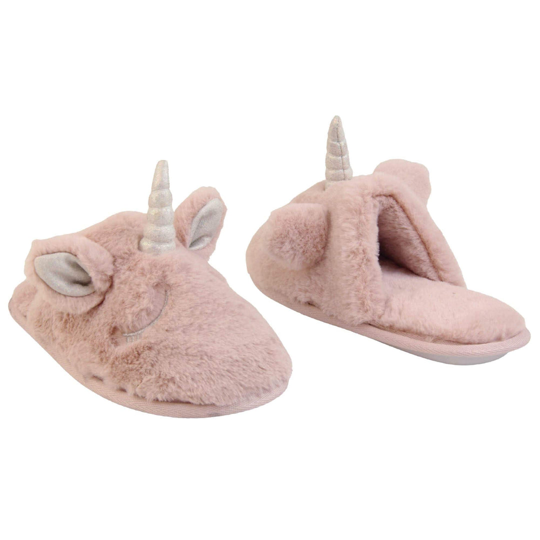 Girls unicorn slippers. Pink faux fur mule style slipper with a unicorn face stitched into the upper. Sparkly ear and horn detail to the top of the upper. Lined with the same faux fur. Both feet at a slight angle facing top to tail.