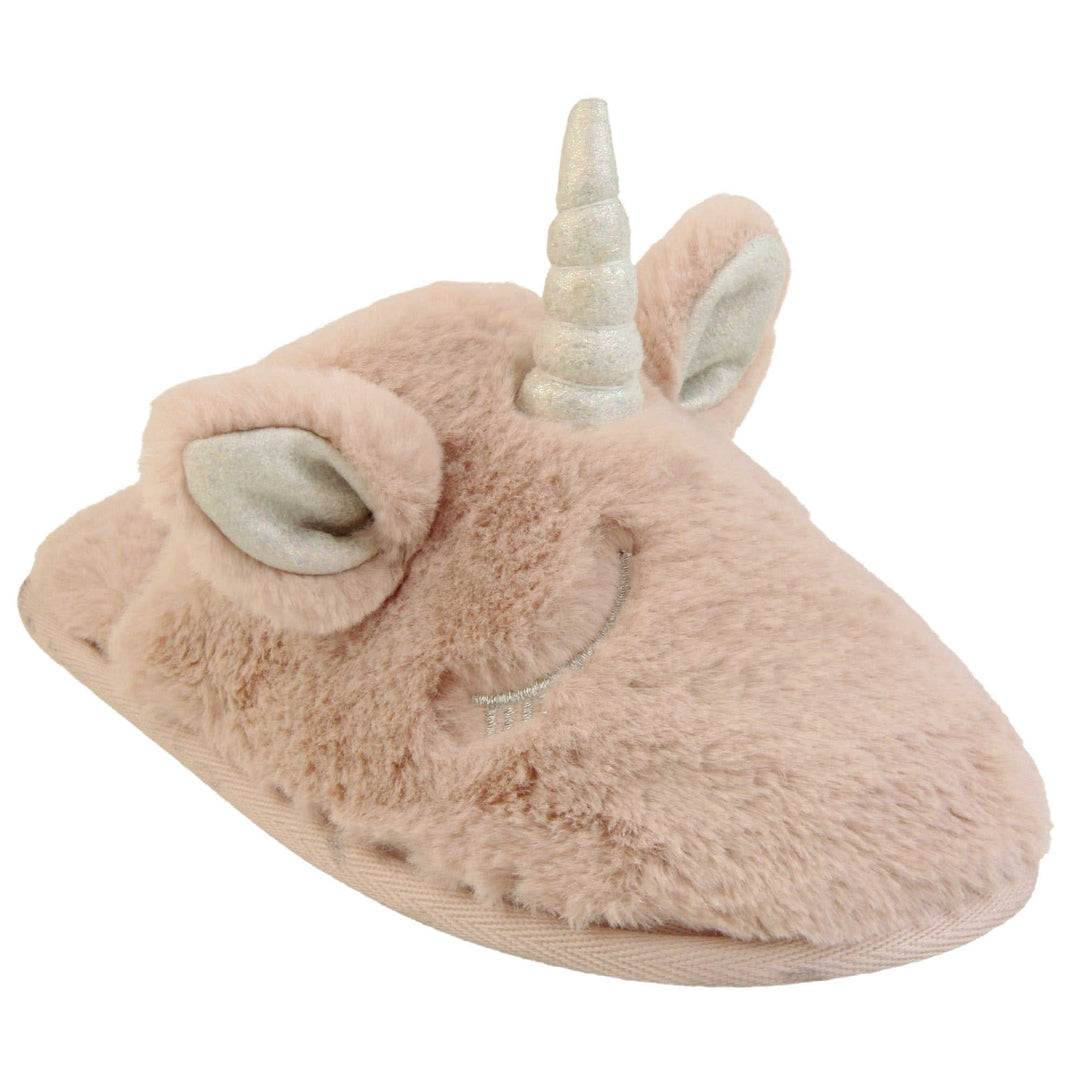 Girls unicorn slippers. Pink faux fur mule style slipper with a unicorn face stitched into the upper. Sparkly ear and horn detail to the top of the upper. Lined with the same faux fur. Right foot at an angle.