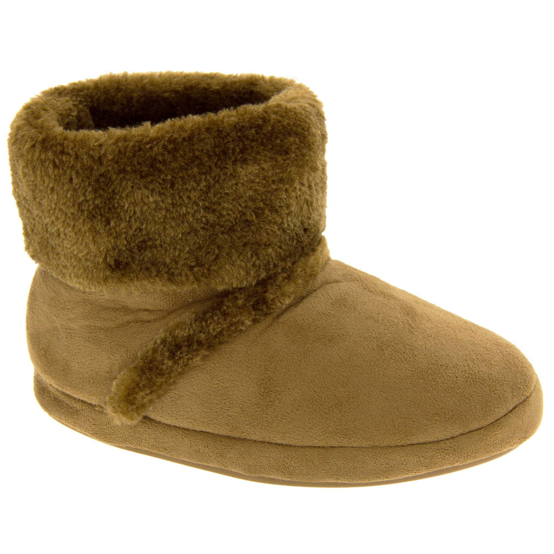 Girls Winter Boot Slippers. Brown faux suede boot style slippers with matching brown faux fur collar and lining. Also has a line of brown faux fur along the ridge of the foot on the upper. Firm sole with wavy lines for grip in the same brown colour. Right foot at an angle.