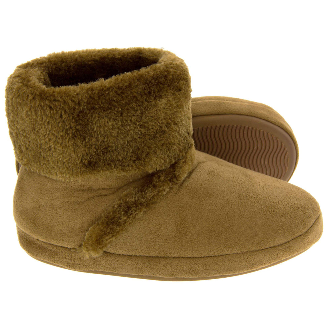 Girls Winter Boot Slippers. Brown faux suede boot style slippers with matching brown faux fur collar and lining. Also has a line of brown faux fur along the ridge of the foot on the upper. Firm sole with wavy lines for grip in the same brown colour. Both feet together from side profile with left foot on its side to show the sole.