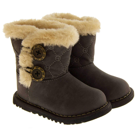 Girls Winter Boot Infant Sizes. Grey faux suede with chunky black sole and cream fur trim around rim and down the side of the boot. 2 buttons on the side with the fax fur as detailing. Both feet together